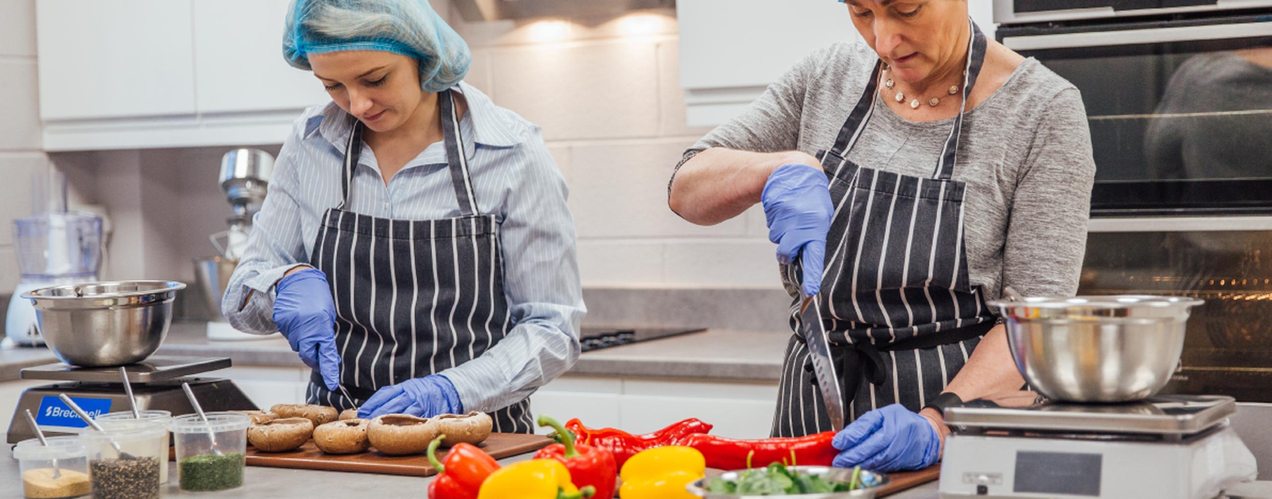 Women preparing vegetables